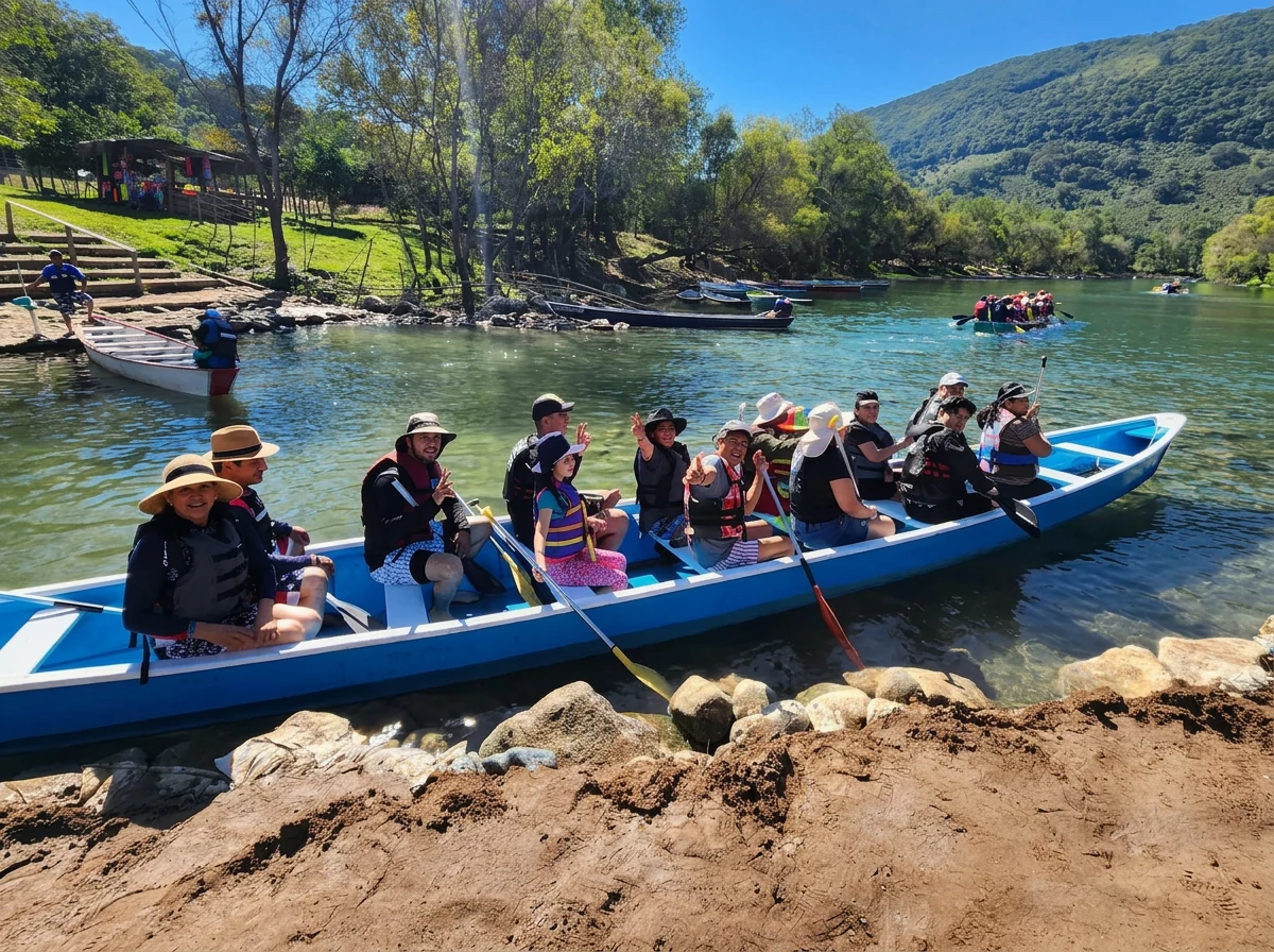 Grupo de viajeros de Shanarani durante un paseo en lancha por un lago de aguas cristalinas rodeado de montañas en México